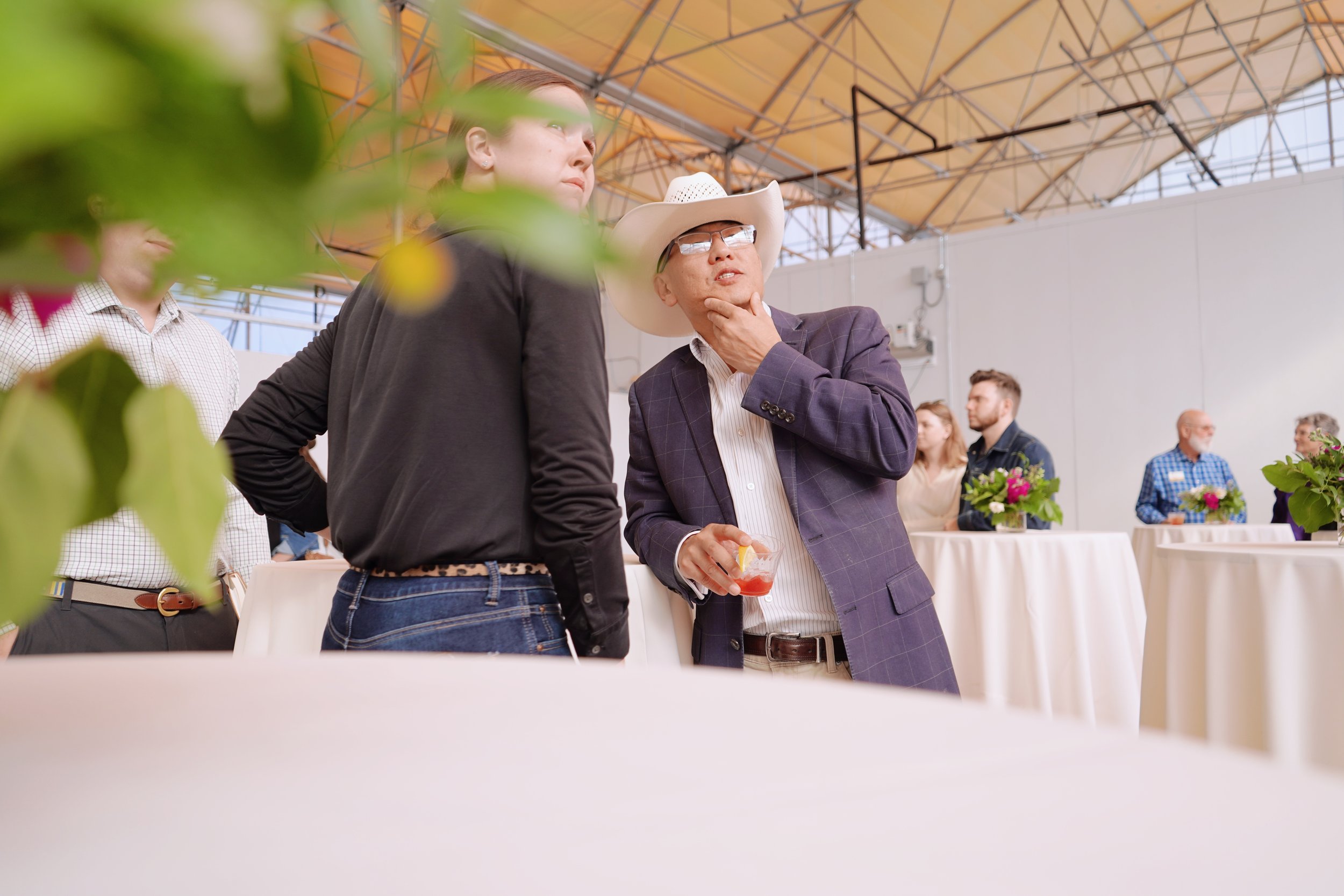 man in cowboy hat at eden green technology grand opening event.jpg